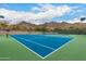 Community tennis court with mountain views in the background at 16013 N 111Th Pl, Scottsdale, AZ 85255