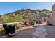Charming backyard with a cozy fire pit and comfortable seating area with mountain views at 1721 E Hatcher Dr, Phoenix, AZ 85020