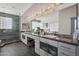 Luxurious bathroom with dual vanity, marble countertops, large mirror, and glass-enclosed shower offer spa experience at 1721 E Hatcher Dr, Phoenix, AZ 85020