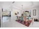 Bright dining room with tile floors, view of the hills, and table that seats eight at 1721 E Hatcher Dr, Phoenix, AZ 85020