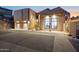 Stunning Southwestern home with a three-car garage, desert landscaping, and ample street parking at 1721 E Hatcher Dr, Phoenix, AZ 85020