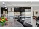 Modern kitchen with stainless steel appliances, granite countertops, and plenty of cabinet space at 1721 E Hatcher Dr, Phoenix, AZ 85020