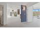 Bright and airy living room featuring custom built-ins, modern lighting and beautiful mountain views at 1721 E Hatcher Dr, Phoenix, AZ 85020