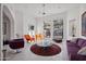 Cozy living room features stylish furnishings, modern decor, and bright, white walls at 1721 E Hatcher Dr, Phoenix, AZ 85020