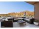 Comfortable outdoor seating area on a covered patio with amazing mountain views at 1721 E Hatcher Dr, Phoenix, AZ 85020