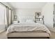 Serene main bedroom features a comfortable bed, neutral decor, and ample natural light at 17211 N 46Th Pl, Phoenix, AZ 85032