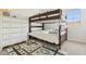 Bedroom featuring a bunk bed and rug at 17211 N 46Th Pl, Phoenix, AZ 85032