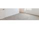 Neutral bedroom with carpet and bright natural lighting at 17648 W Sanna St, Waddell, AZ 85355