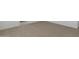 Bedroom carpet and baseboards at 17744 W Hatcher Rd, Waddell, AZ 85355