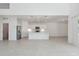 Spacious kitchen featuring stainless appliances, a large center island, and plenty of bright cabinet space at 17744 W Hatcher Rd, Waddell, AZ 85355