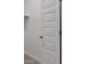 Walk-in closet with a clean white interior and silver hardware at 17744 W Hatcher Rd, Waddell, AZ 85355