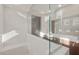 Bright bathroom features a glass shower and double sink vanity at 17788 W Getty Dr, Goodyear, AZ 85338