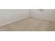 Clean bedroom with plush carpeting and neutral walls at 17788 W Getty Dr, Goodyear, AZ 85338
