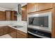 Close up of modern kitchen with stainless steel appliances and granite countertops at 17788 W Getty Dr, Goodyear, AZ 85338