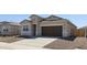 Beautiful single-story home with a two-car garage and a well-maintained front yard with desert landscaping at 18377 W Gray Fox Trl, Wittmann, AZ 85361