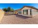 Backyard area with covered patio and plenty of space for outdoor activities at 1980 E Horseshoe Dr, Chandler, AZ 85249