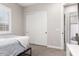 Serene bedroom with soft bedding, closet, and large window offering ample light at 1980 E Horseshoe Dr, Chandler, AZ 85249