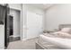 Comfortable bedroom featuring closet, desk, soft lighting and neutral tones at 1980 E Horseshoe Dr, Chandler, AZ 85249
