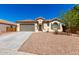 Charming single-story home with well-maintained landscaping, and a two car garage at 1980 E Horseshoe Dr, Chandler, AZ 85249