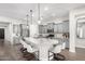 Stylish kitchen boasting gray cabinetry, granite countertops, a large island with seating, and stainless steel appliances at 1980 E Horseshoe Dr, Chandler, AZ 85249