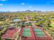 Beautiful aerial view showcasing community amenities including a pool, tennis courts, a basketball court, and desert landscaping at 2040 N Dome Rock --, Mesa, AZ 85207