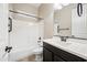 Well-lit bathroom with single vanity, tub and shower combination, and modern fixtures in neutral tones at 2040 N Dome Rock --, Mesa, AZ 85207