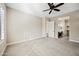 Bedroom featuring neutral walls, carpet flooring, ceiling fan, and view to ensuite bath at 2040 N Dome Rock --, Mesa, AZ 85207