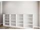 Built-in shelving unit provides ample storage space and organization in a well-lit room with neutral tones at 2040 N Dome Rock --, Mesa, AZ 85207