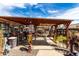 Large backyard with covered outdoor area, ideal for projects at 2145 N Silverton St, Mesa, AZ 85203