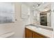 The bathroom features a vanity with a sink, a toilet, and a shower at 2145 N Silverton St, Mesa, AZ 85203