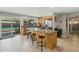 Bright kitchen featuring stainless steel appliances, granite countertops, and a breakfast bar with seating at 2405 E Balboa Dr, Tempe, AZ 85282