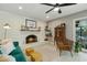 Inviting living room features a charming fireplace, plush seating, and stylish decor accents at 2405 E Balboa Dr, Tempe, AZ 85282
