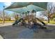Well-maintained playground with multiple slides, climbing structures, and a shaded play area at 2405 E Balboa Dr, Tempe, AZ 85282