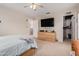 Bedroom with ceiling fan, TV, and closet access at 3239 E San Manuel Rd, San Tan Valley, AZ 85143