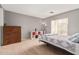 Bedroom featuring a large window, dresser and cozy carpet at 3239 E San Manuel Rd, San Tan Valley, AZ 85143