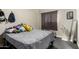 Cozy bedroom with comfortable bed, fan, and window, offering a relaxing space at 3340 W Ironwood Dr, Phoenix, AZ 85051
