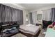 Bedroom with a colorful bedspread and modern vanity at 3340 W Ironwood Dr, Phoenix, AZ 85051