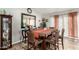 Inviting dining room with seating for six and a large mirror at 3340 W Ironwood Dr, Phoenix, AZ 85051