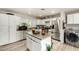 Bright kitchen with stainless steel appliances and a granite countertop island at 3340 W Ironwood Dr, Phoenix, AZ 85051