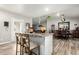 Open kitchen with a granite island and access to dining area at 3340 W Ironwood Dr, Phoenix, AZ 85051