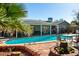 Relaxing poolside scene with patio furniture and palm trees at 3340 W Ironwood Dr, Phoenix, AZ 85051