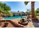 Backyard swimming pool with decorative brickwork and patio at 3340 W Ironwood Dr, Phoenix, AZ 85051