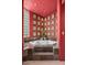 Bathroom features a garden tub surrounded by framed art and large windows at 40635 N 109Th Pl, Scottsdale, AZ 85262