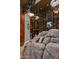 Unique indoor water feature with natural rock and custom lighting for a serene ambiance at 40635 N 109Th Pl, Scottsdale, AZ 85262