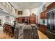 Gourmet kitchen featuring granite counters, custom cabinets, stainless appliances, and boulder island at 40635 N 109Th Pl, Scottsdale, AZ 85262