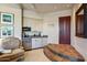 Kitchenette with stainless steel appliances, cabinets, sink, and decorative accents at 40635 N 109Th Pl, Scottsdale, AZ 85262