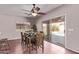 Dining area with backyard pool view, and contemporary ceiling fan at 4086 E County Down Dr, Chandler, AZ 85249