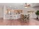 Open concept dining area adjacent to the kitchen with a modern ceiling fan at 4086 E County Down Dr, Chandler, AZ 85249