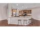 Bright kitchen with modern cabinets, stainless steel appliances, and breakfast bar seating at 4086 E County Down Dr, Chandler, AZ 85249