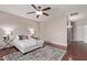 Bright bedroom with a plush bed, stylish rug, and ample natural light at 4086 E County Down Dr, Chandler, AZ 85249